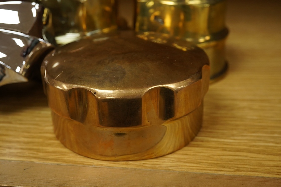 Six substantial Victorian brass wagon axle hubs, all threaded internally, together with two Daimler emblems, both with two integral threaded bolts to the reverse (8). Condition - good.